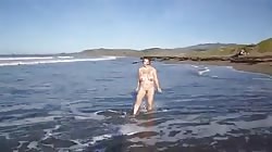 Walking naked at the beach