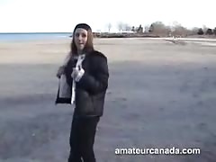 Cock-loving brunette is walking on the camera and touching her tits